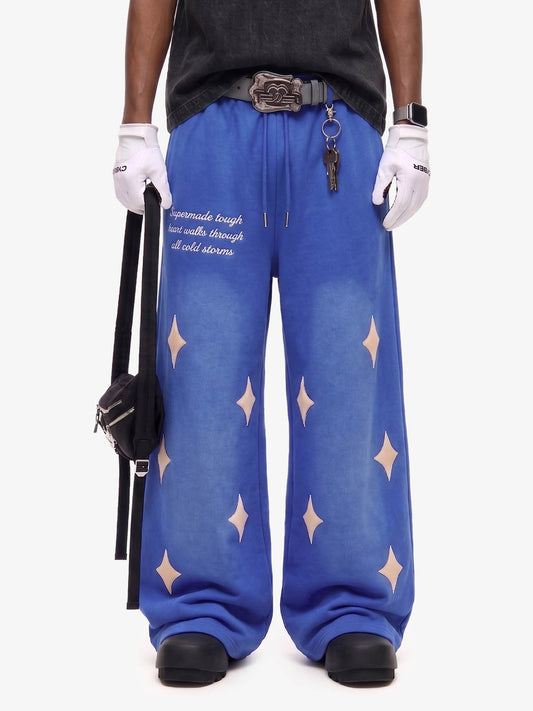 Jogginghose mit Sternen-Spray-Print im Used-Look