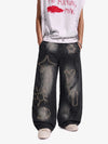 Vintage-Scimitar-Jeans mit verwaschenem, gesäumtem Graffiti-Muster und Stickerei