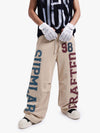 Baggy Pants im Retro-Color-Block-Stil mit Buchstabenprint