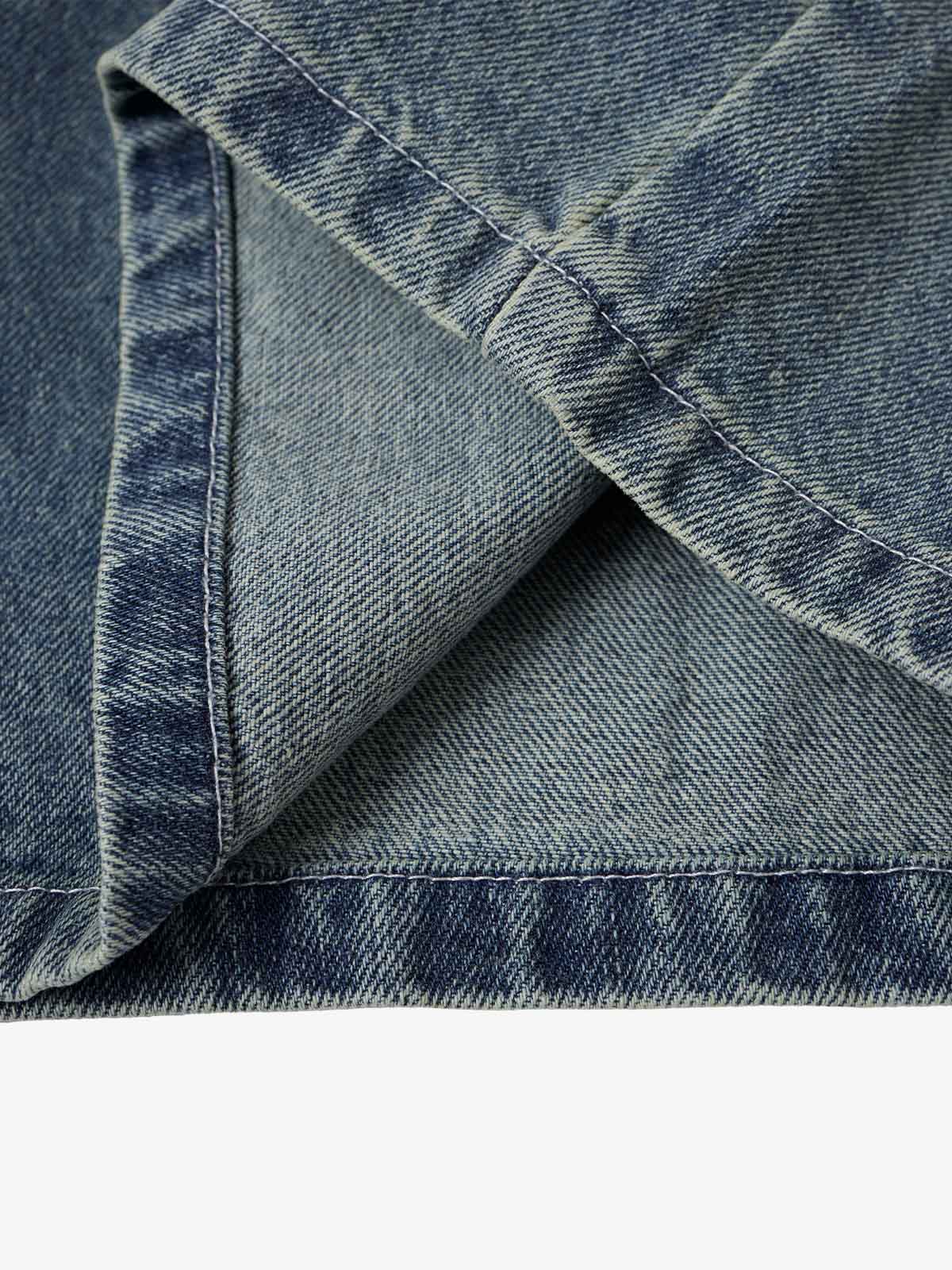 Jeansshorts mit Spinnennetzstickerei