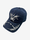 Jeanskappe mit Flammenstickerei