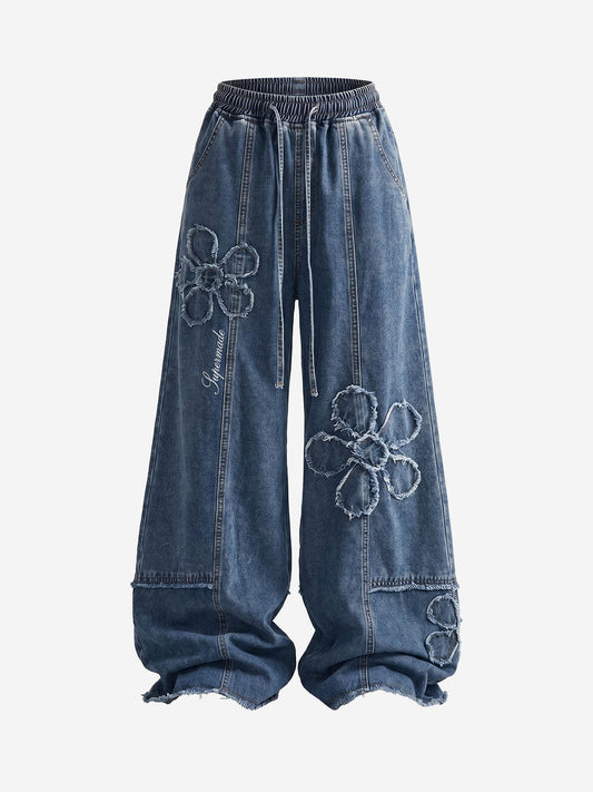 Jeans mit Applikationsstickerei und weitem Bein