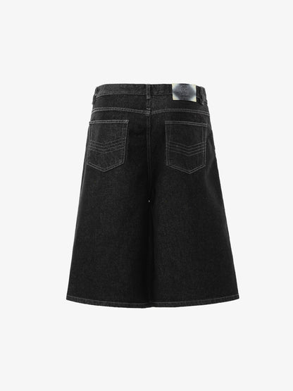 Asymmetrische Jeansshorts mit mehreren Knöpfen