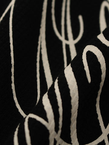 Waffelstrick-T-Shirt mit seitlichem Schriftzug