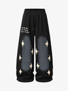 Jogginghose mit Sternen-Spray-Print im Used-Look