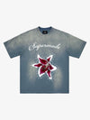 T-Shirt mit gewaschenem Blumen- und Sternenmuster