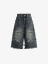 Ausgefranste, mehrlagige Jeans-Shorts mit Einsätzen