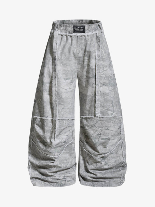 Weite Hose mit Batikmuster und Kordelzug
