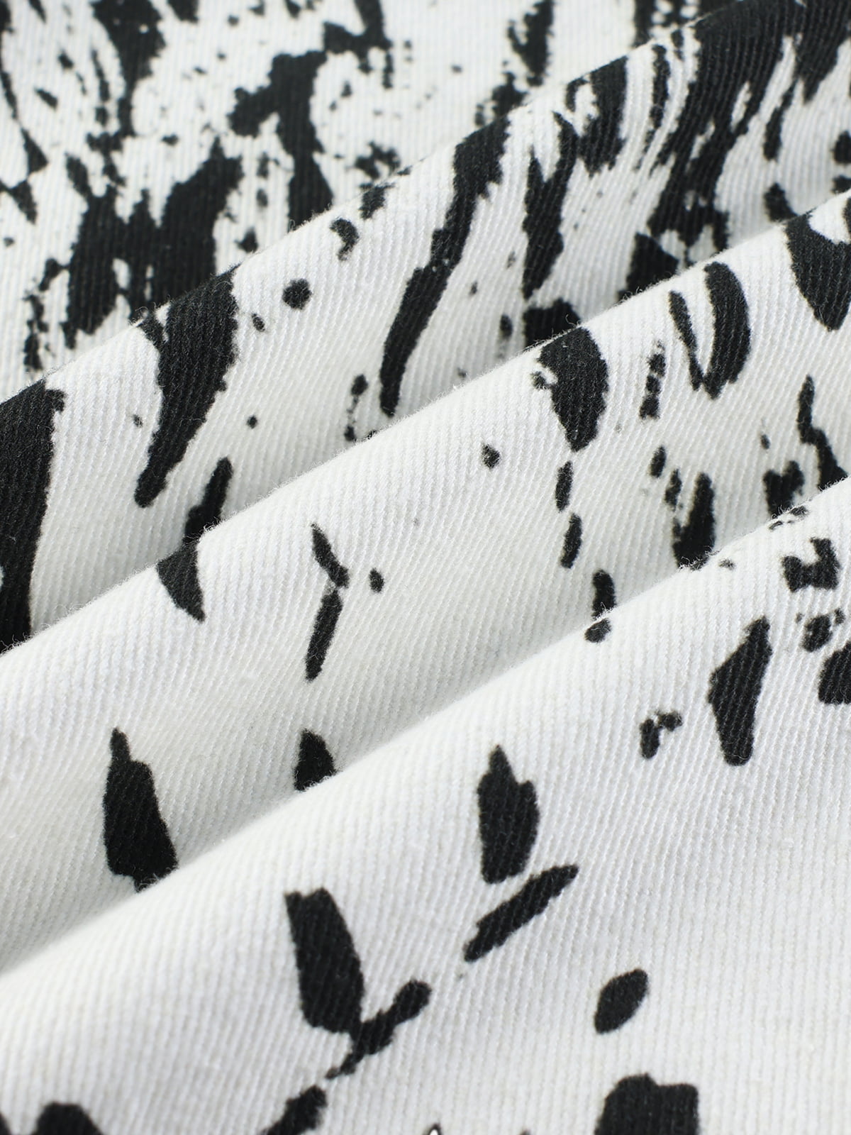 Weit geschnittene Hose mit abstraktem Print – Hochgeschnittene Hose aus Baumwollmischgewebe